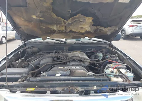 1999 Toyota Tacoma Limited V6 из США, поврежденный, VIN 4TAWN74N5XZ402706